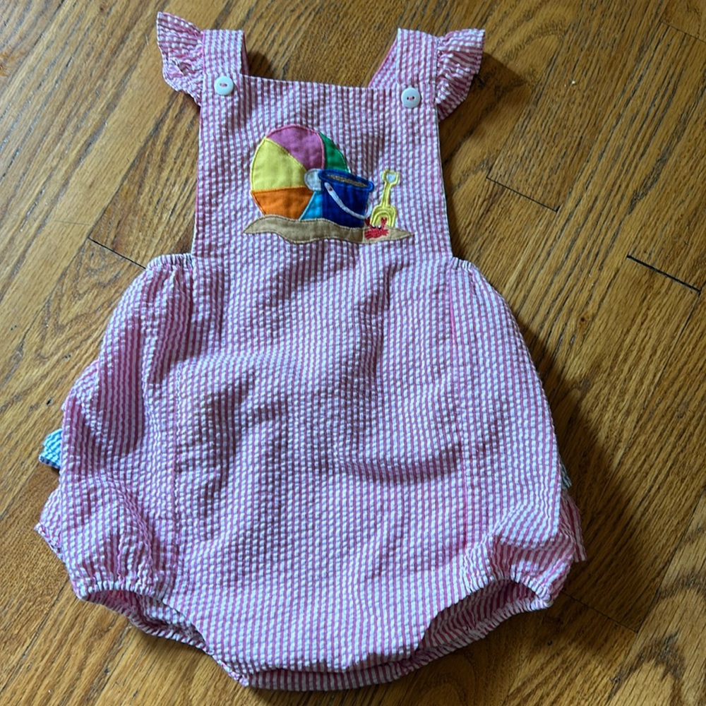 Pink seersucker onsie with beach theme
